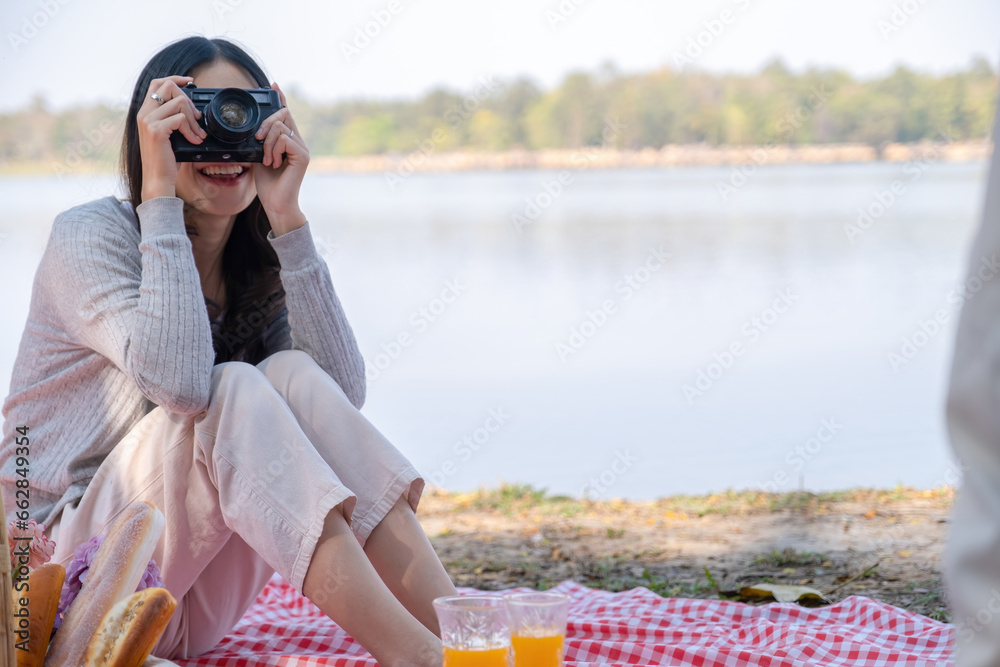 Couple having a picnic in a beautiful and natural park