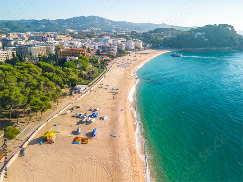 Fenals, Lloret de Mar Aerial view with Drone from the beach, Blue, turquoise, dense water, green vegetation, Mediterranean, transparent, nature, European quality tourism photo