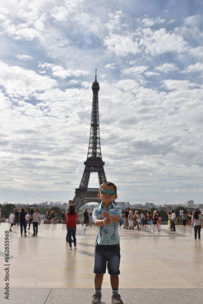 Kid traveling,on Eiffel Tower