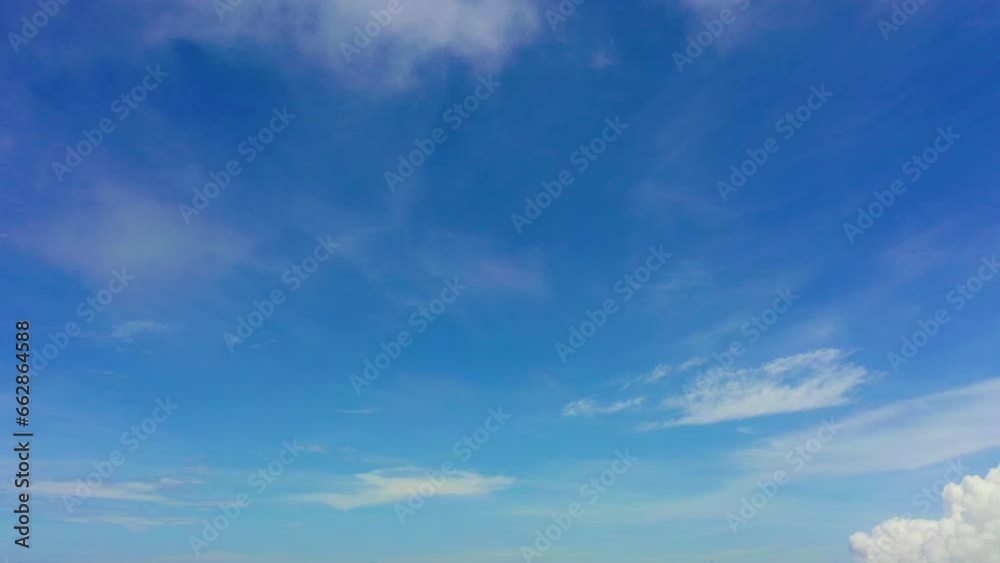 .Natural daylight and white clouds floating on blue sky..aerial panorama view white clouds in the blue sky background..light through the large white clouds float in the blue sky .Natural daylight and white clouds floating on blue sky..aerial panorama view white clouds in the blue sky background..light through the large white clouds float in the blue sky