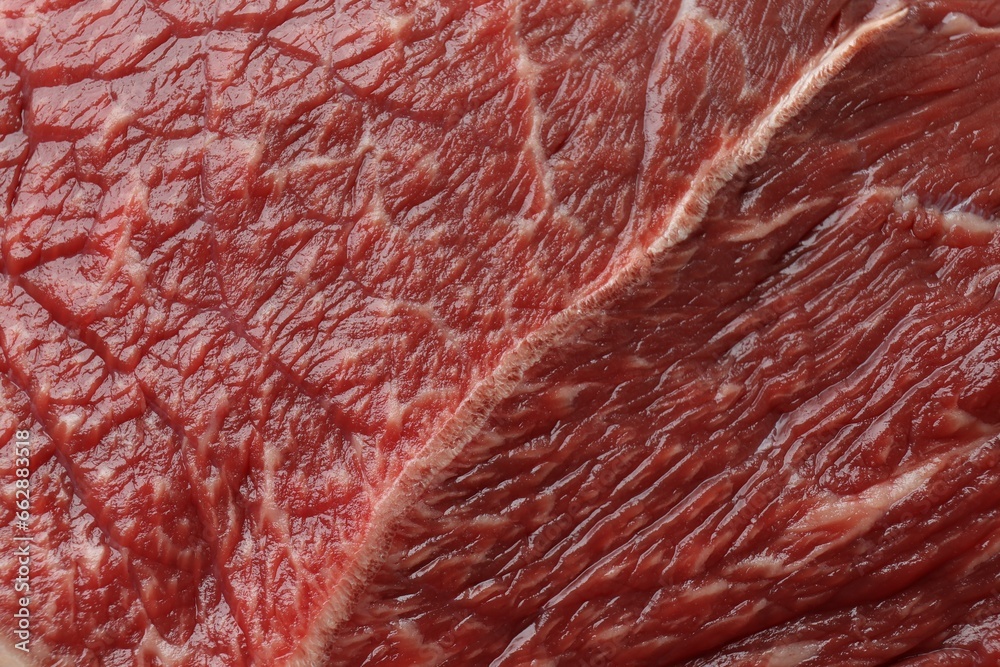 Texture of fresh beef meat as background, closeup Texture of fresh beef meat as background, closeup