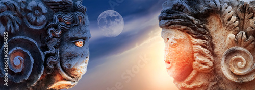 Bas-relief in the Myra ancient city. Turkey. Day and night concept. Banner format. photo