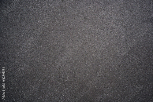 Empty black and white (dark gray) cement grunge wall, abstract concrete texture background, grungy wall textures with scratches patterns, copy space for work, banner, wallpaper, decoration and design.