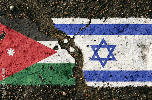 Obraz na plátně On the pavement are images of the flags of Israel and Jordan, as a symbol of confrontation
