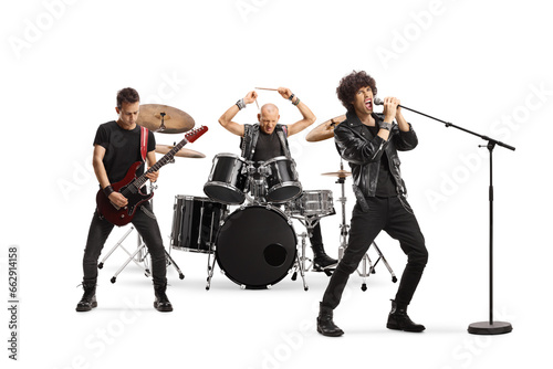 Male music band performing with a guitarist, drummer and a singer