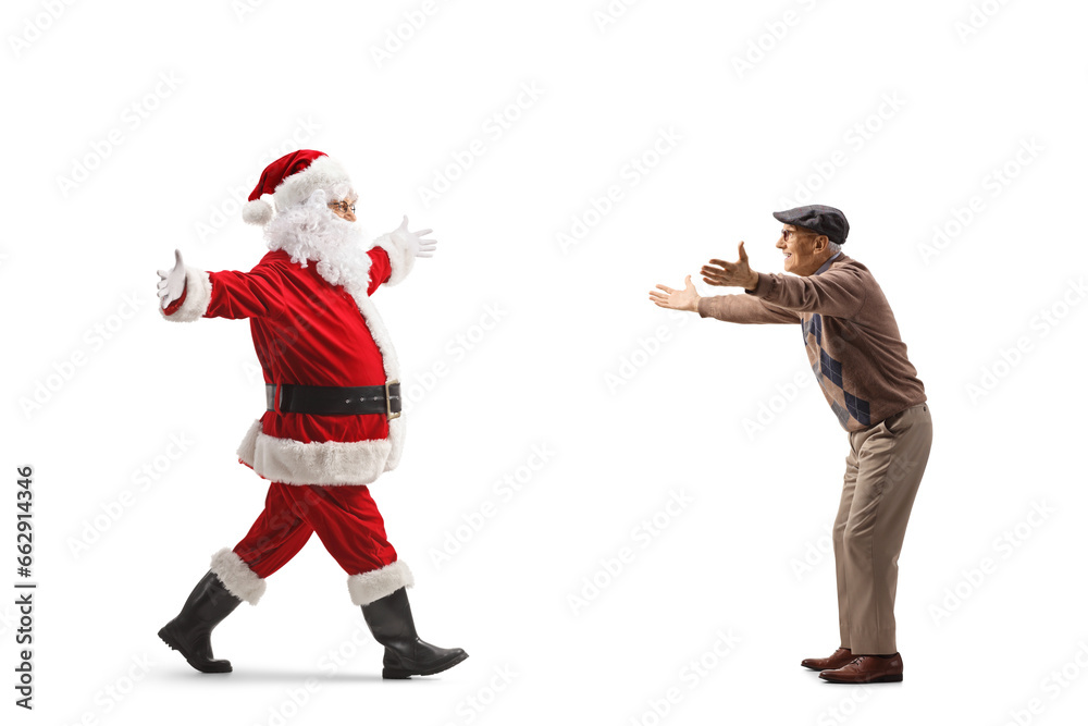 Full length profile shot of santa claus meeting a friend