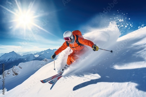 Skier skiing down a mountain slope  © blvdone