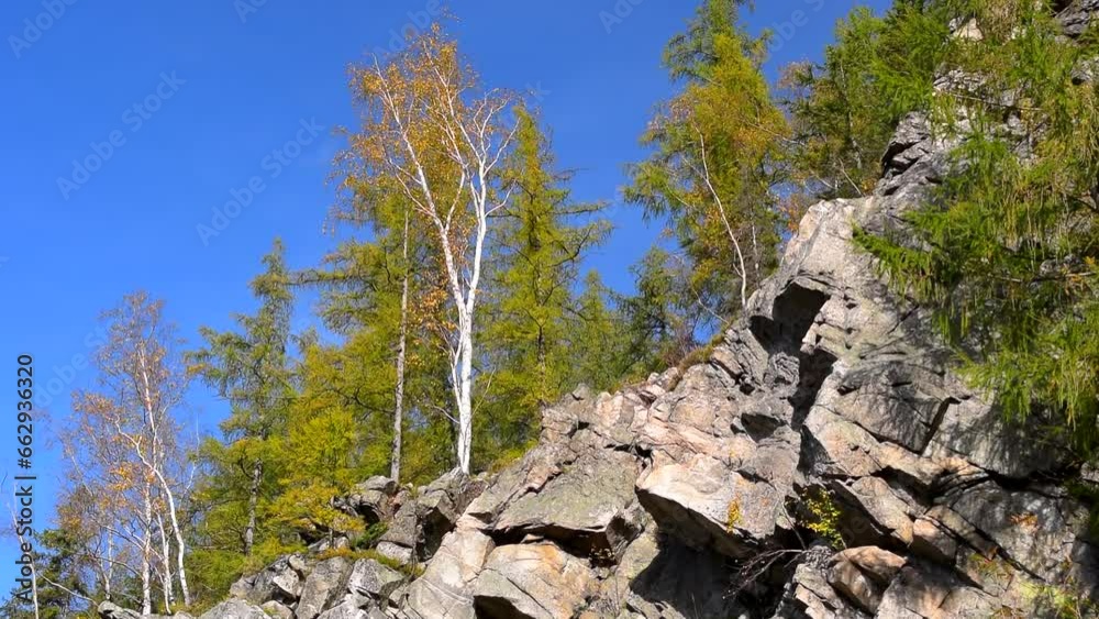 Mountain rocks, trees landscape on blue sky. Calm natural scene, sunny day, view, nature, tree, birch, park, stones, rocky, rock, peak, steep, big, cliff, hills, hill, wild, season, hd. ProRes 422HQ