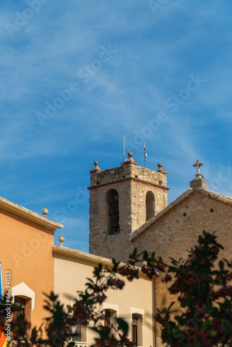 Beautiful church and bell tower in the old town, in Alalà de la Jovada, Alicante (Spain) photo