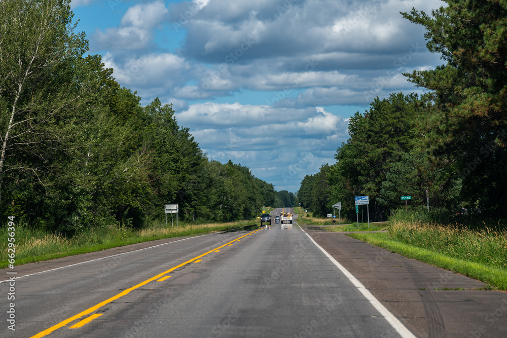 Looking down the center line of a country road in rural Minnesota, USA.
