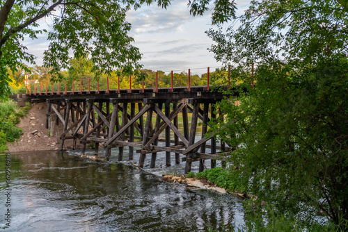 Wooden railroad bridge over the Otter Tail River in Fergus Falls, Minnesota.
 photo