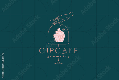 Obraz na płótnie Cake stand with cupcake in art deco style holding by hand drawing on dark turquoise background w salonie