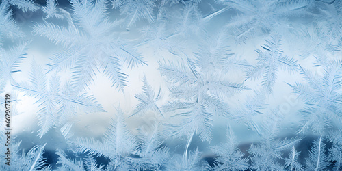 Winter frost on glass with ice crystals  winter background 