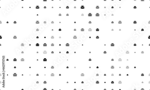 Seamless background pattern of evenly spaced black castle symbols of different sizes and opacity. Illustration on transparent background