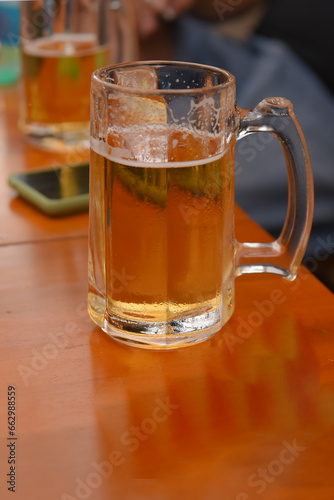 beer mug on wooden table alcoholic drink fun and leisure