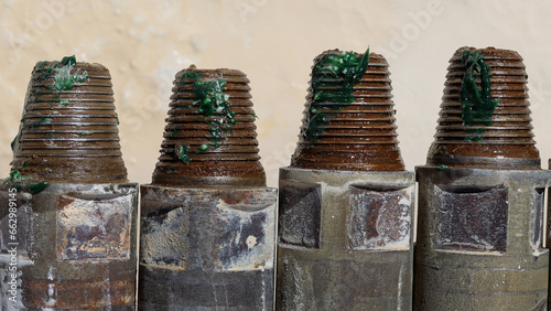 Fotografi threaded drill sterns with green grease