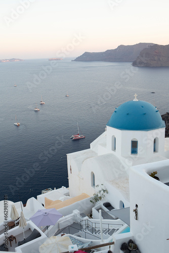 Beautiful landscape scenic view of the coastal Mediterranean Sea in Santorini, Greece, Oia village with blue dome church landmark