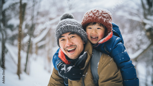 Winter bonding: A happy father and son connect with nature, finding joy in the snowy landscape.