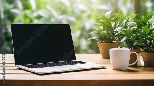 Workspace Harmony: Wooden Table Set with Laptop, Blank Screen, Warm Coffee, and Soft Plant Blur Background. Perfect Blend of Technology and Natural Serenity. Manually Modified Generative AI