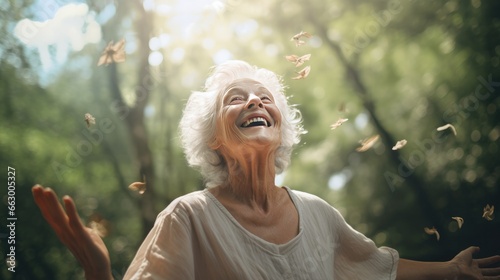 a woman laughing with trees in the background photo