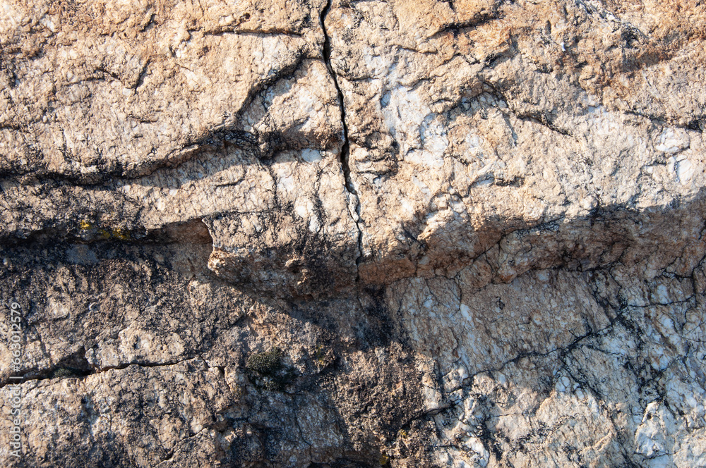 Rough cracked gray stone texture for background Rough cracked gray stone texture for background