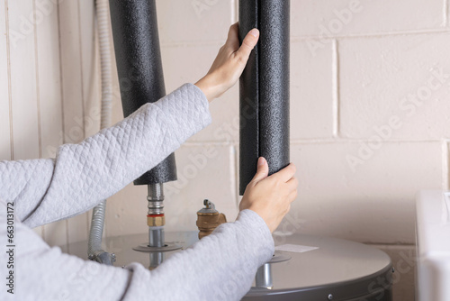 Hot water heater pipe insulation. Installing pipe insulation