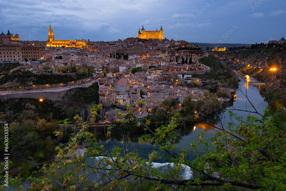 Evening photo of Toledo with view of Tagus River, Castilla-La Mancha, Spain.