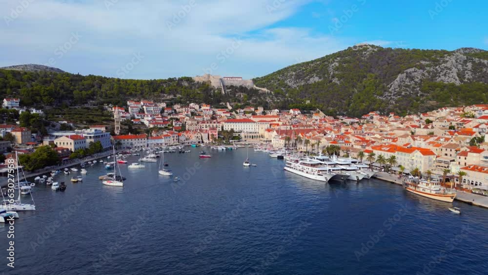Aerial drone view of Hvar, Croatia during the daytime in the harbor. Aerial drone view of Hvar, Croatia during the daytime in the harbor.