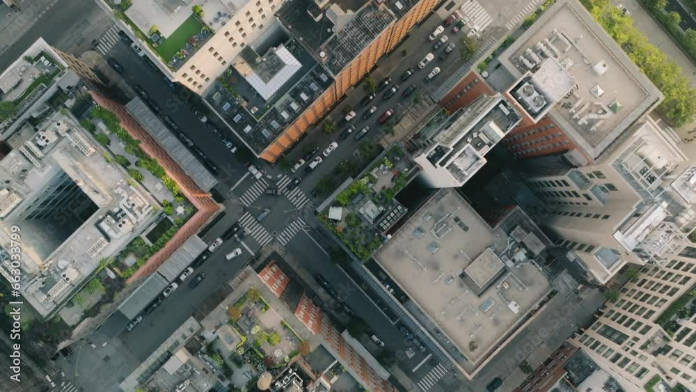 Aerial view city view. Top down view on buildings and skyscrapers rooftops, street traffic in New York City. Overhead aerial cars driving in Midtown Manhattan.NYC travel concept copy background 4K USA Aerial view city view. Top down view on buildings and skyscrapers rooftops, street traffic in New York City. Overhead aerial cars driving in Midtown Manhattan.NYC travel concept copy background 4K USA