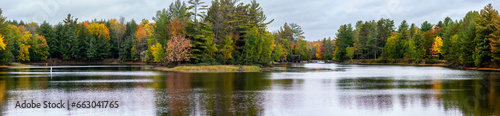 Wallpaper Mural Waterfalls flowing into Lake of the Falls in Mercer, Wisconsin in September Torontodigital.ca