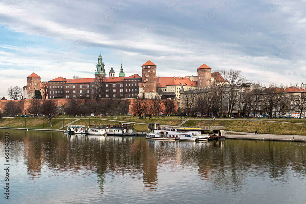 .Wawel castle famous landmark in Krakow Poland. Picturesque landscape on coast river Vistula 