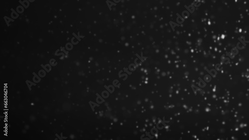 Snowfall particles. Winter storm. Abstract illustration of glowing soft snow falling cold night sky on dark free space background.