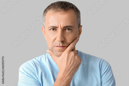 Portrait of pondering matur...