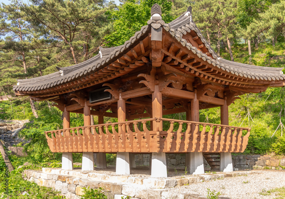 Korean architecture - close up of a wooden pagoda in traditional Korean style Korean architecture - close up of a wooden pagoda in traditional Korean style