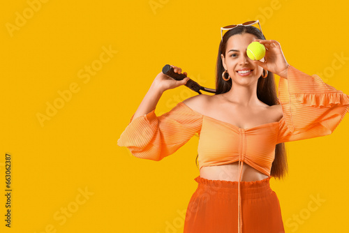 Stylish young woman with te...