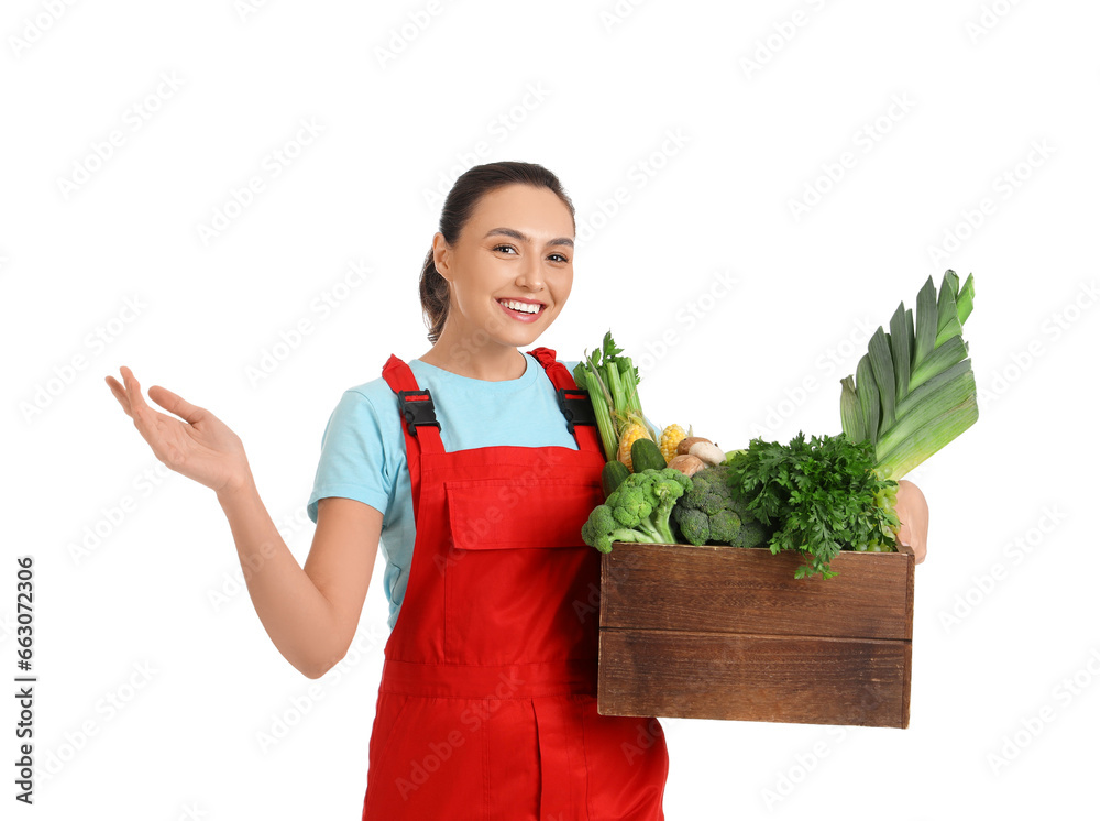 Female farmer with box of vegetables on white background Female farmer with box of vegetables on white background