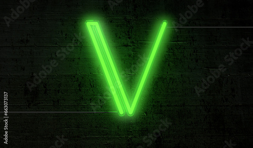 Bright neon letter 'V' on a background of black bricks, projecting an electrifying aura.