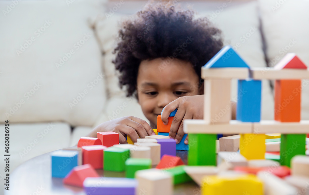 Little boy hands of little children play blocks in classroom. Learning by playing education group study concept. International pupils do activities brain training in primary school background banner - obrazy, fototapety, plakaty 