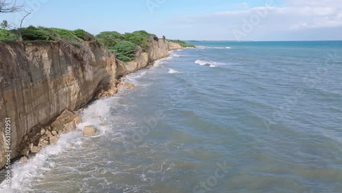 Aerial View of Matanzas Beach and cliff in Bani City, Peravia Province, Dominican Republic. Drone shot. photo