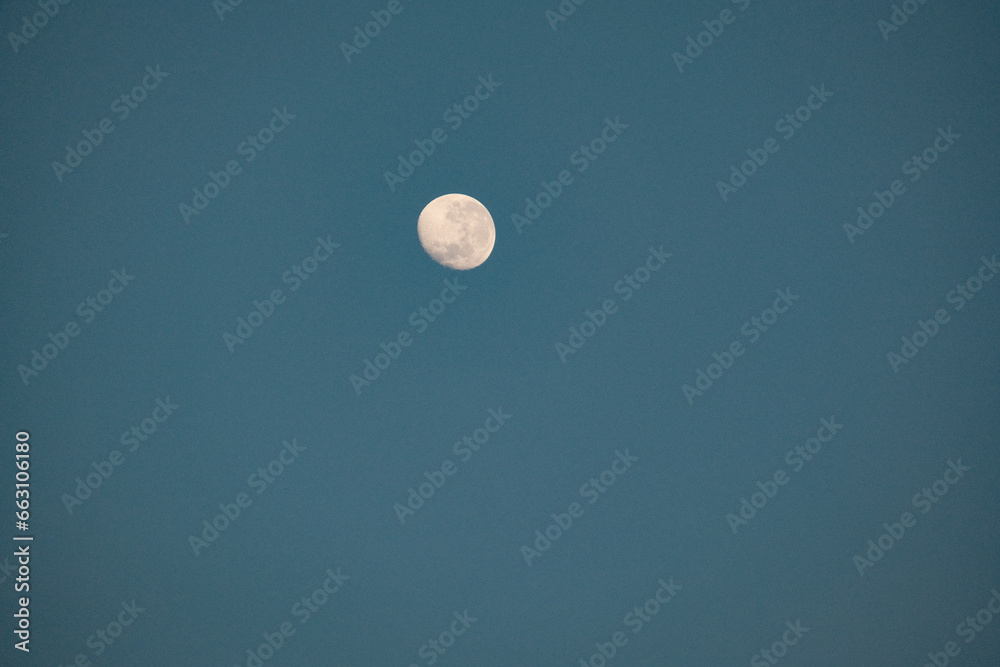 Celestial Harmony: Moon in the Clear Blue Sunrise Sky Celestial Harmony: Moon in the Clear Blue Sunrise Sky