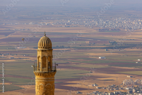 Ancient and stone houses of Old Mardin (Eski Mardin) with Mardin Castle, Located South Eastern of Turkey photo