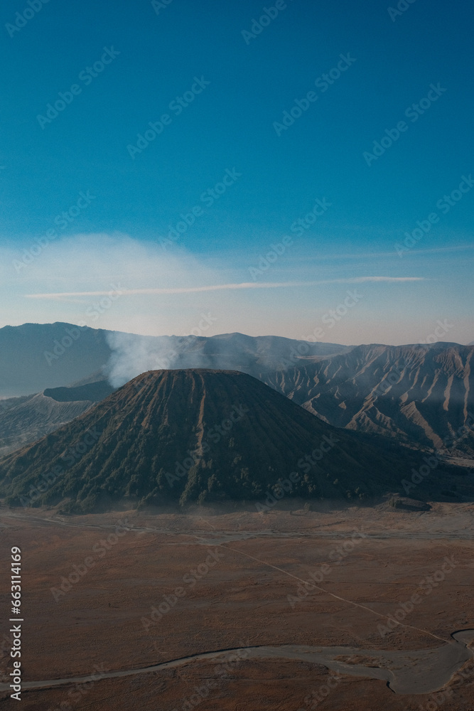 Bromo's Domain: Zooming Out to Reveal the Desert Plain Below