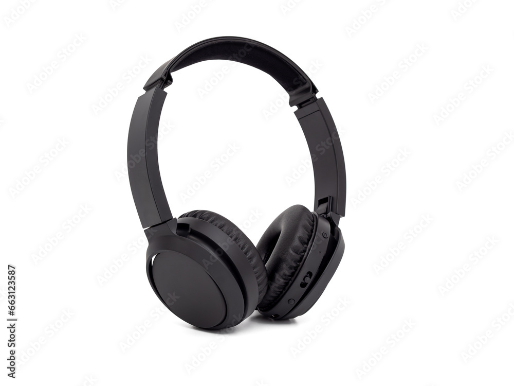 Black wireless headphones isolated on a white background. Wireless headphones close-up. Black wireless headphones isolated on a white background. Wireless headphones close-up.