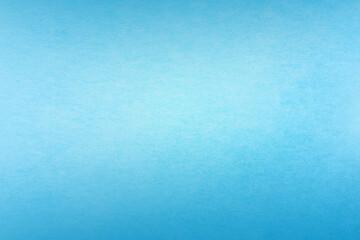 Light pale blue tone color paint on environmental friendly blank cardboard box paper texture background with minimal style and space