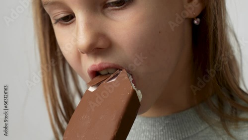Child with ice cream on a white background