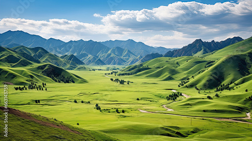 Sweeping vista landscape of the Assy Plateau  a large mountain steppe valley and summer pasture 100km from Almaty  Kazakhstan.
