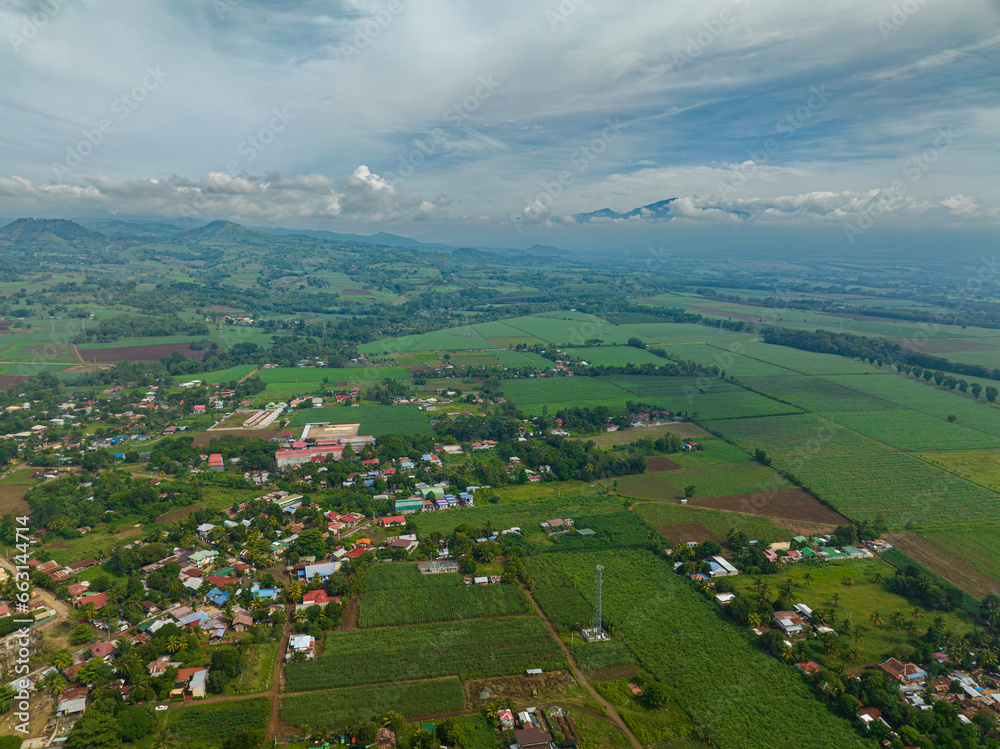 Tropical mountain province with village of farmers and agricultural land in the Philippines. Mindanao.