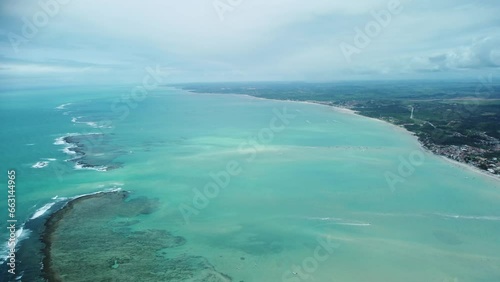 Aerial footage of the Antunes Beach on a cloudy day in Maragogi, Alagoas, Brazil photo