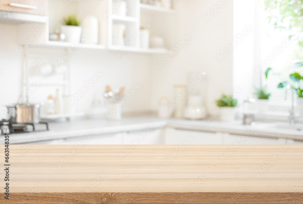 Wooden table top view for product montage over blurred kitchen interior background - obrazy, fototapety, plakaty 