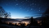 Winter night in the mountains with starry sky